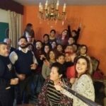 family gathering in Christmas Family Tradition taking a selfie.