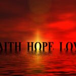 A wallpaper with the words 'faith hope love' written in elegant script on a colorful background.